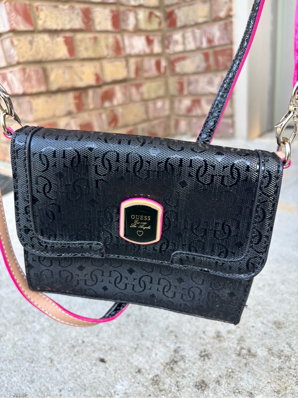 GUESS Los Angeles Black Monogram Flap Crossbody Bag Pink Trim Accent